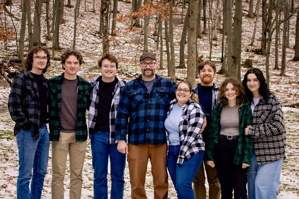 The Bolopue family in a winter wood